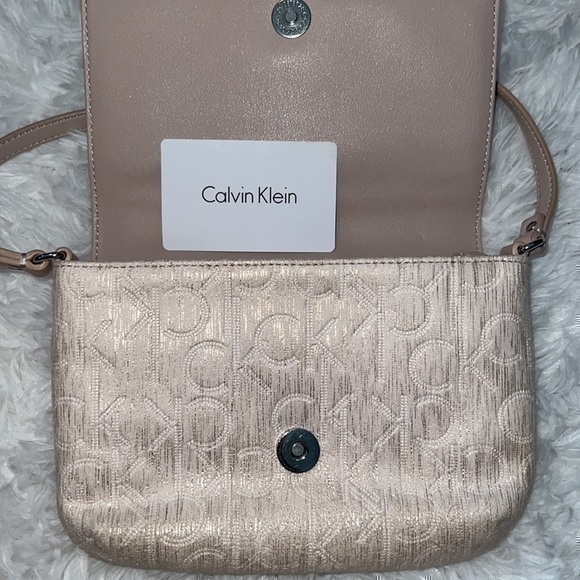 Calvin Klein Handbags - Calvin Klein - small clutch - beige color